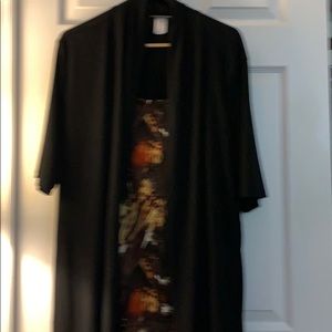 Shirt with jacket attached. In excellent cond.